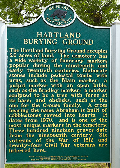 Michigan Historic Marker recognizing the Hartland Burying Ground. Image ©2015 Look Around You Ventures, LLC.